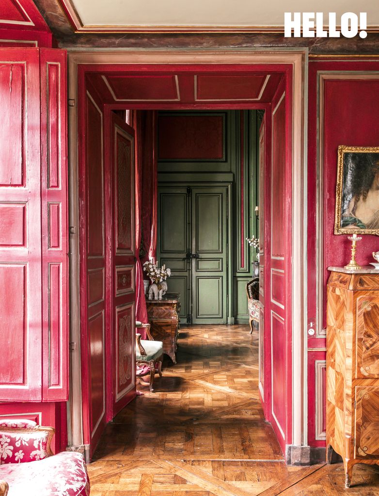 The salon boasts gilded wood panelling and 18th-century furniture in Château de Sourches