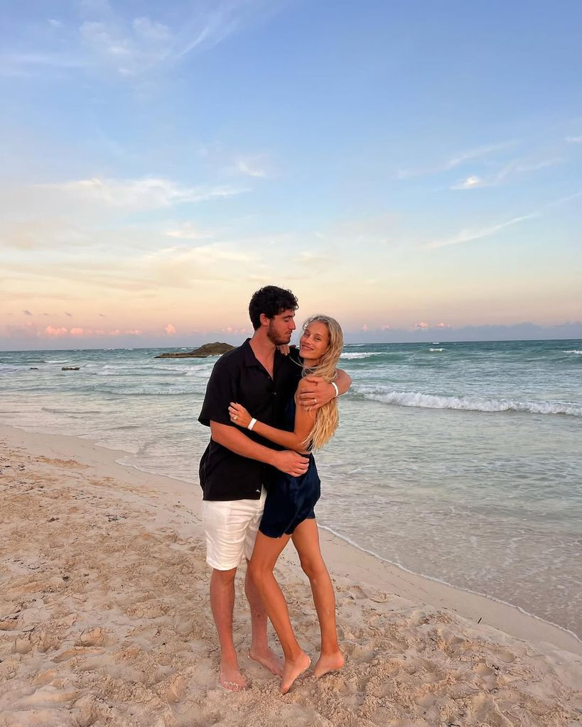 Chase Carter and Cody Bellinger embrace in a photo taken on the beach, shared on Instagram