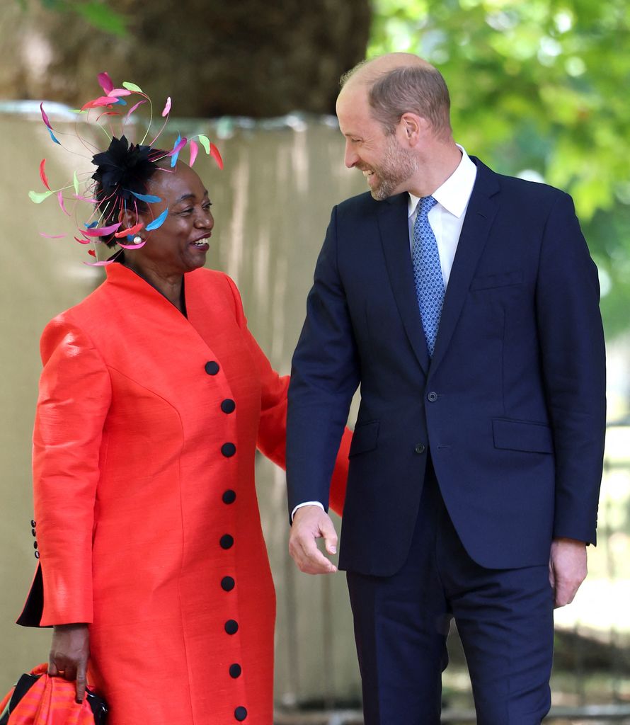 Britain's Prince William, Prince of Wales speaks with London bombings survivor Thelma Stober during a service at the 7/7 memorial 