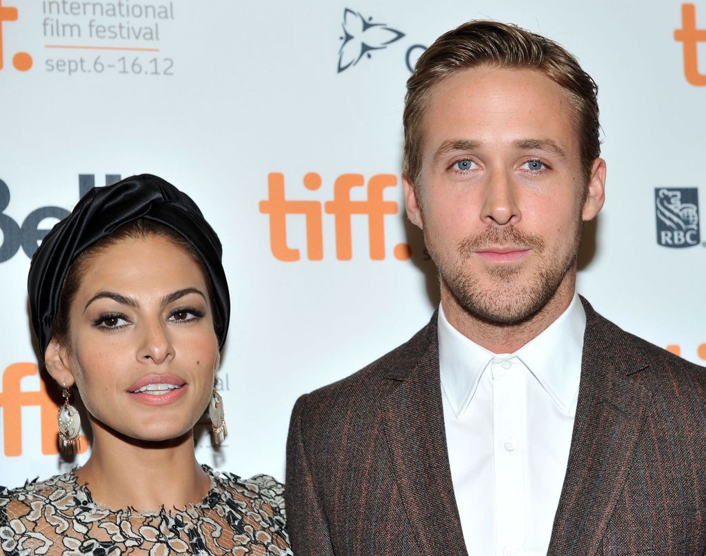 Eva Mendes and Ryan Gosling smiling together 