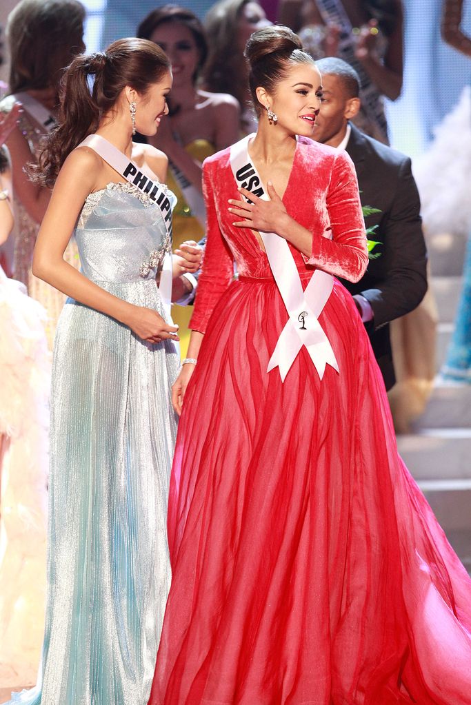 LAS VEGAS, NV - DECEMBER 19:  Miss Philippines 2012 Janine Tugonon (L) and Miss USA 2012 Olivia Culpo (R) and  react   during the 2012 Miss Universe Pageant at Planet Hollywood Resort & Casino on December 19, 2012 in Las Vegas, Nevada.  (Photo by Marcel Thomas/FilmMagic)