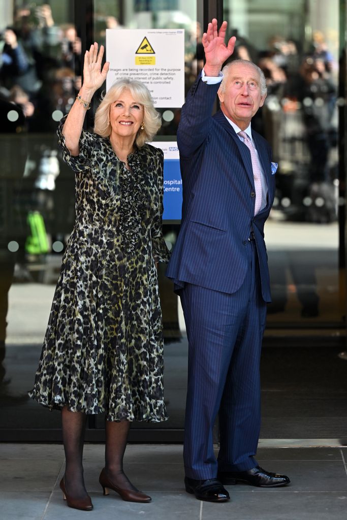 King Charles and Queen Camilla wave