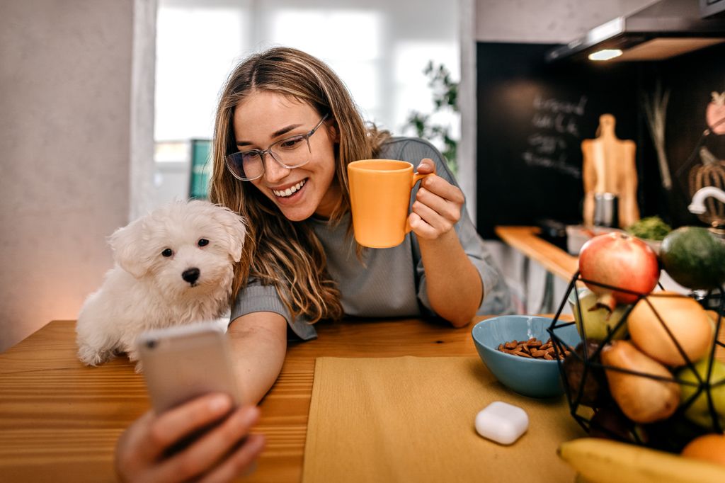  woman and dog selfie.