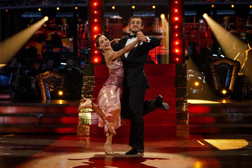 Alexis Warr and George Clarke dancing a quickstep