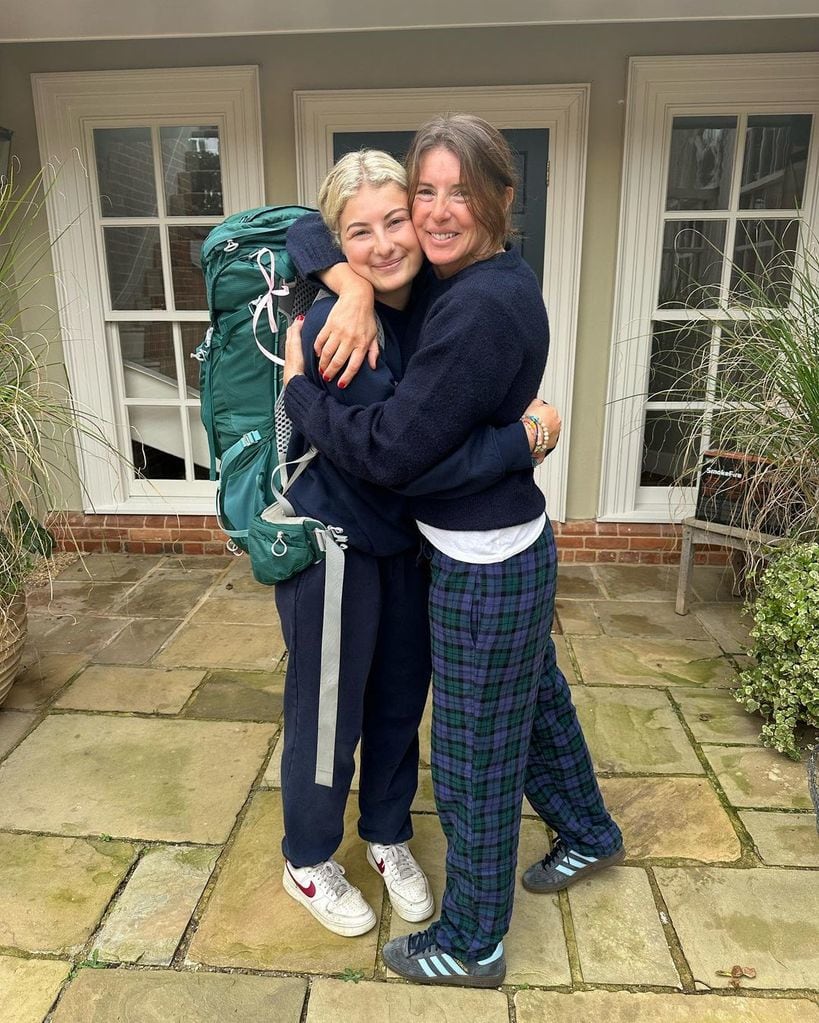 Jools Oliver hugging daughter Poppy tightly as she headed to the airport