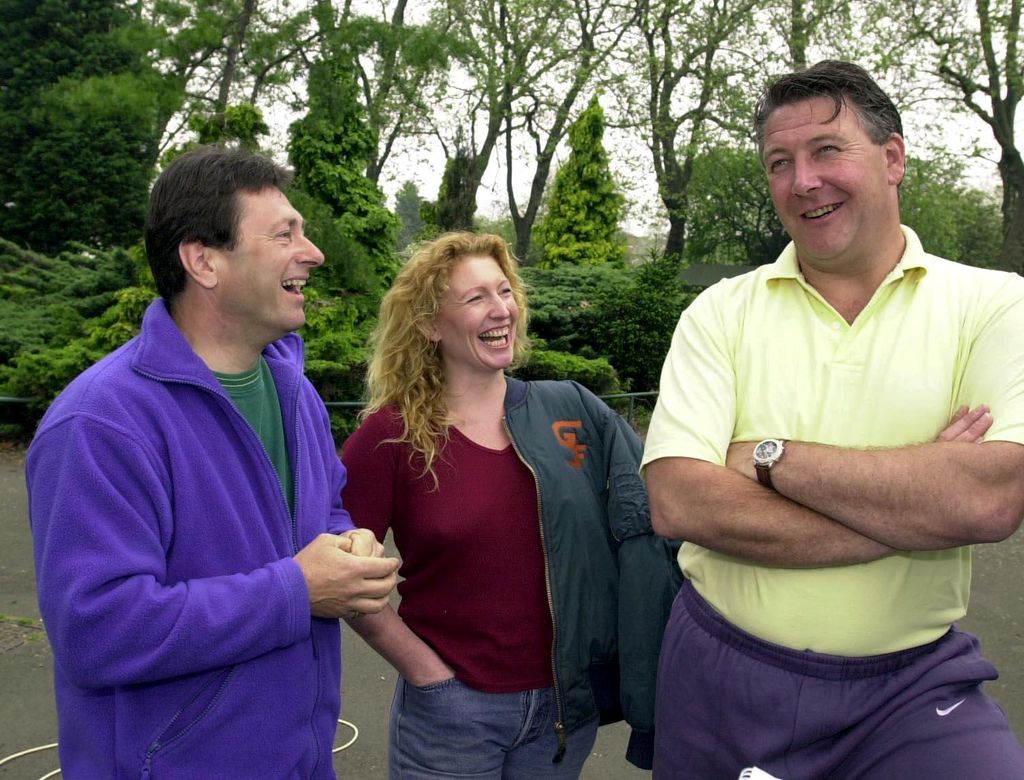 trio of people laughing 