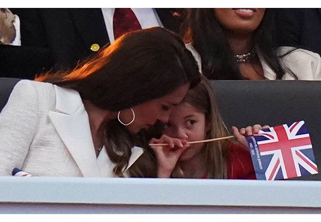 kate middleton and princess charlotte sunggle in royal box