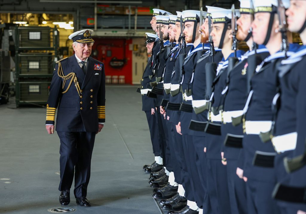The King wearing naval uniform on HMS Prince of Wales