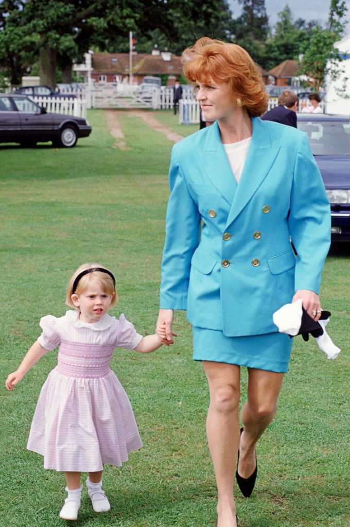 Princess Beatrice, pictured here in 1991, in pink dress alongside mum sarah ferguson in aqua skirt suit