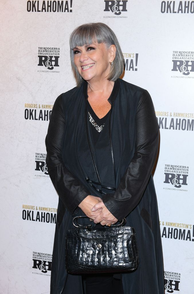 Dawn French on a red carpet in black