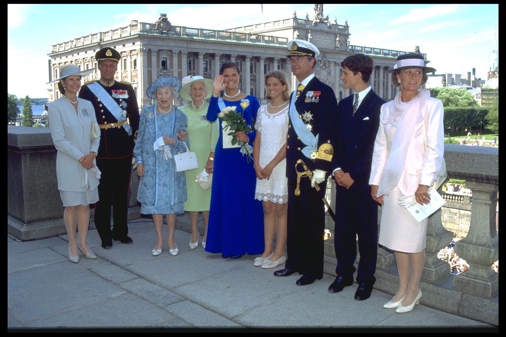 Crown Princess Victoria wearing blue dress with Swedish royals on 18th birthday