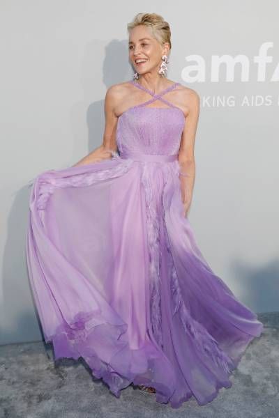 Sharon Stone in purple dress during amfAR Gala 2021