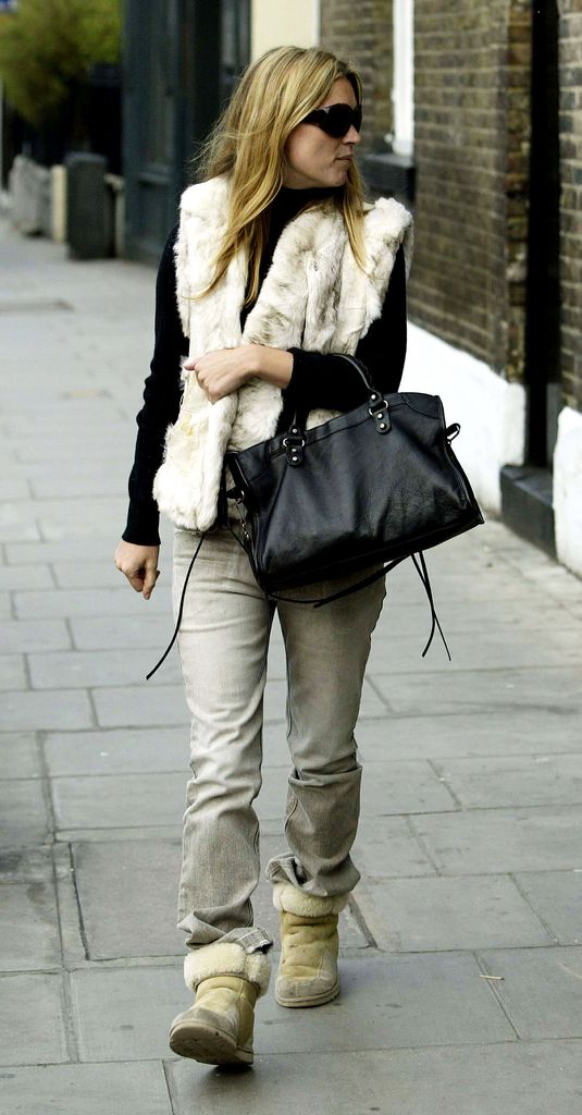Kate Moss takes an afternoon strool on December 16, 2003 in West London
