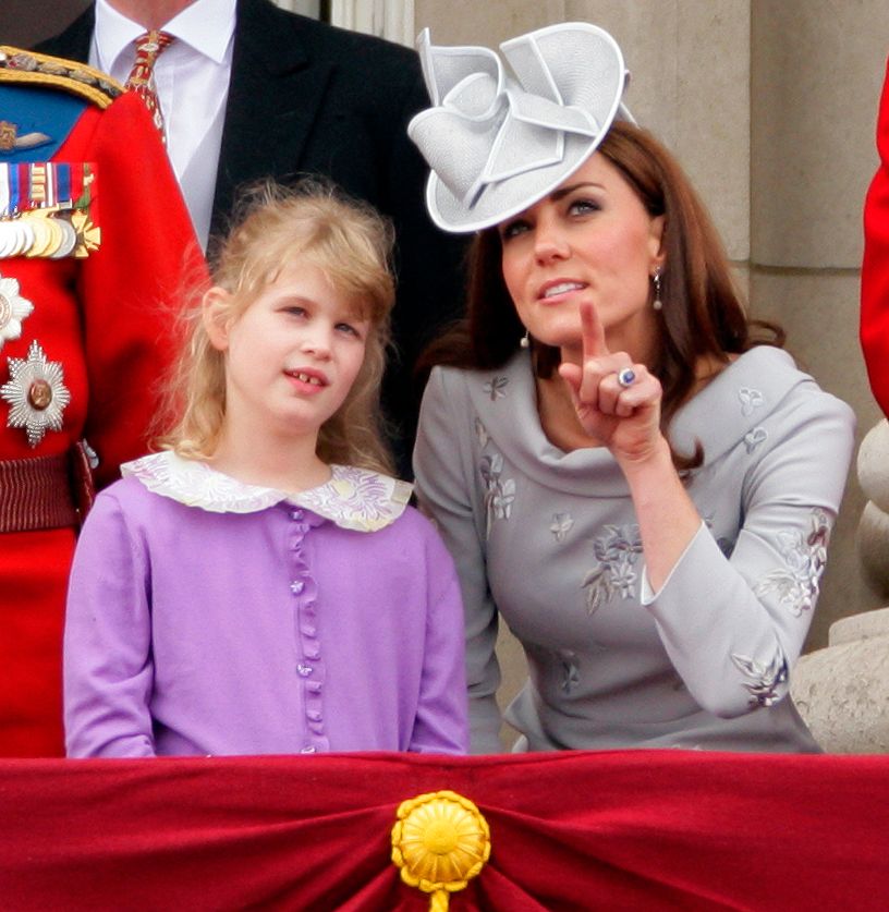 Lady Louise Windsor and Catherine, Duchess of Cambridge stand on the balcony of Buckingham Palace during the annual Trooping the Colour Ceremony