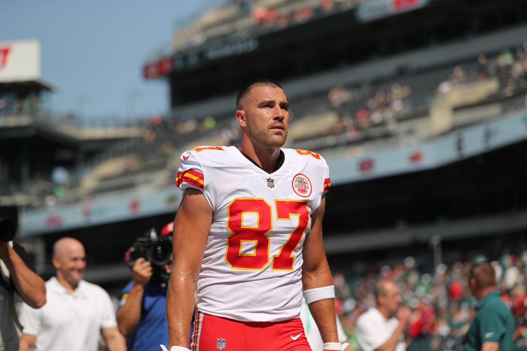 Travis Kelce #87 of the Kansas City Chiefs walks off the field prior to an NFL football game against the Philadelphia Eagles 