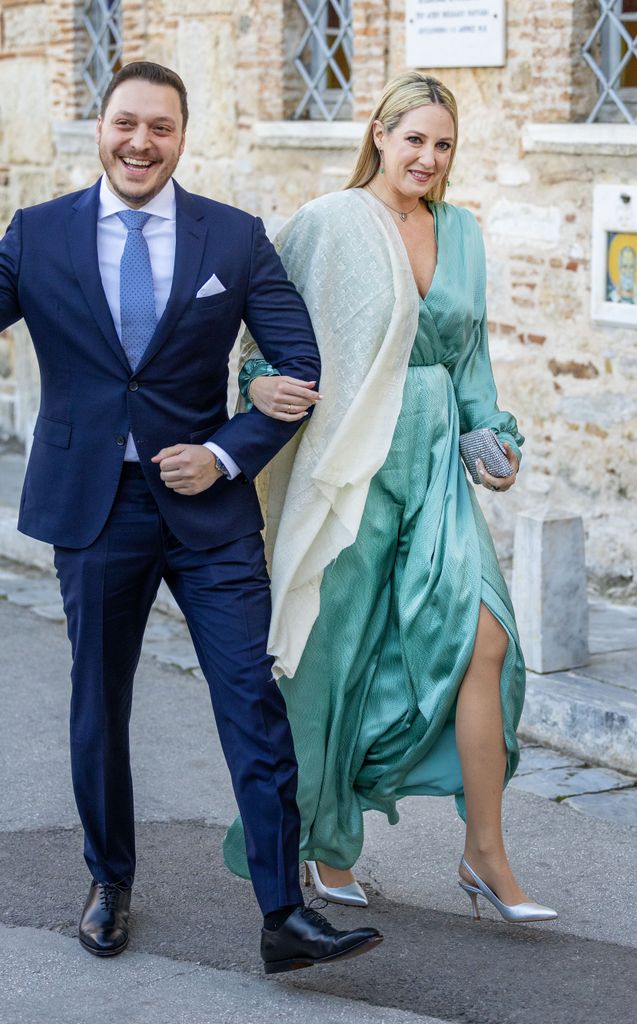 Princess Theodora of Greece in a blue thigh-split dress with Matthew Kumar