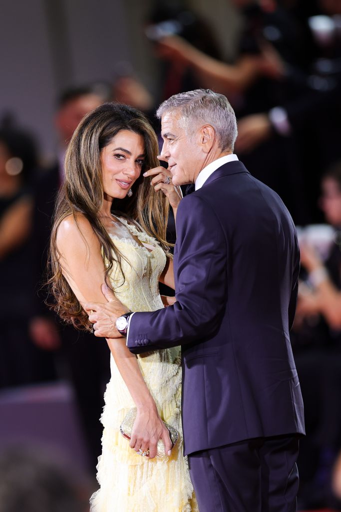 Amal Clooney and George Clooney attends the "Wolfs" red carpet during the 81st Venice International Film Festival on September 01, 2024 in Venice, Italy. (Photo by Jacopo Raule/FilmMagic)