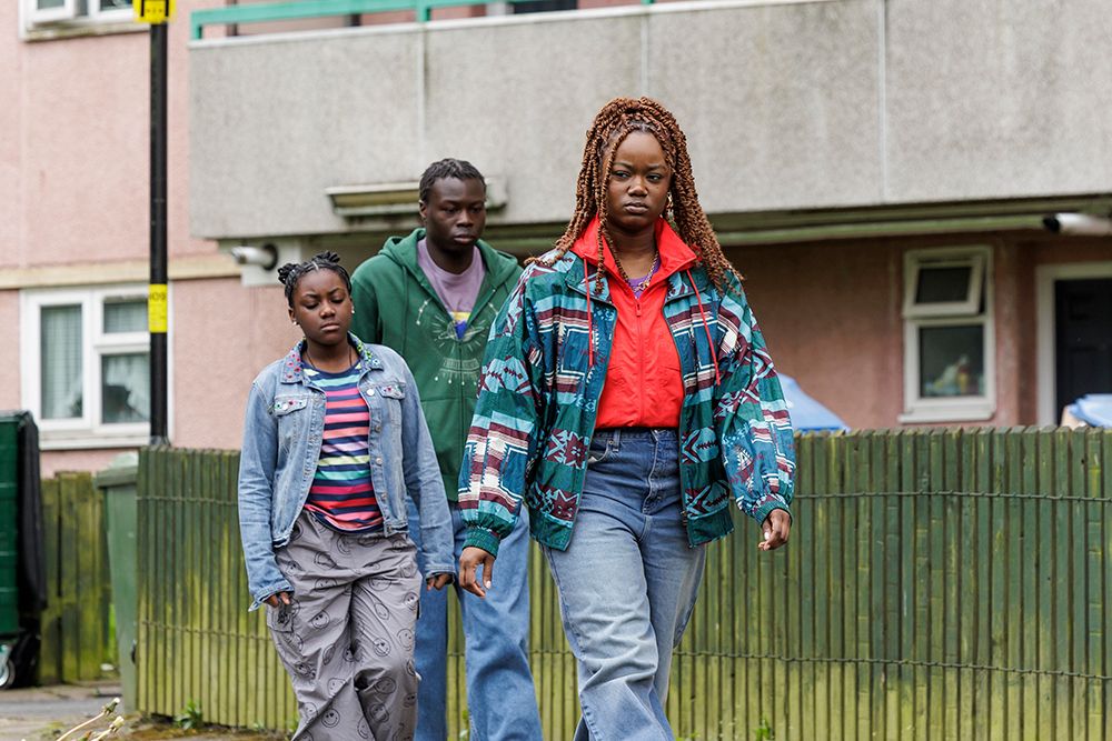 Tanika (KAYDRAH WALKER-WILKIE);Tionne (AKINS SUBAIR) and Tiana (CHENÉE TAYLOR) walking down the street