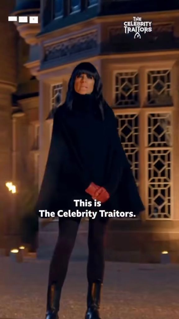 Claudia Winkleman wearing a black cape coat on celebrity traitors