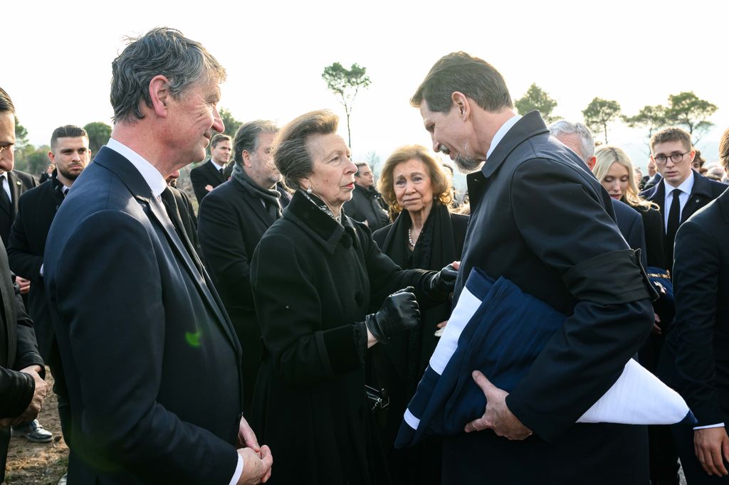 Princess Anne and Sir Tim Laurence greet Crown Prince Pavlos at Constantine's funeral