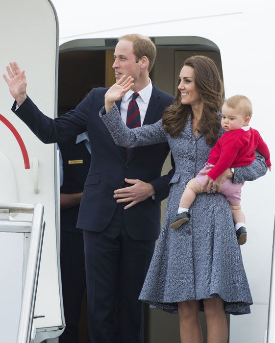 prince william & kate middleton waving from the door of a airplane