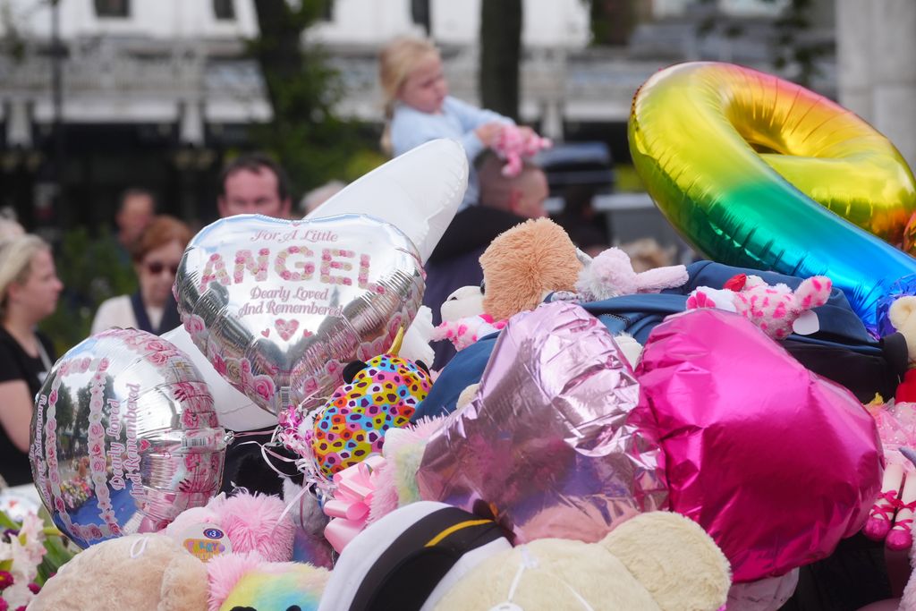 floral tributes and balloons in Southport 