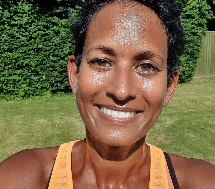 Naga Munchetty smiling in her garden