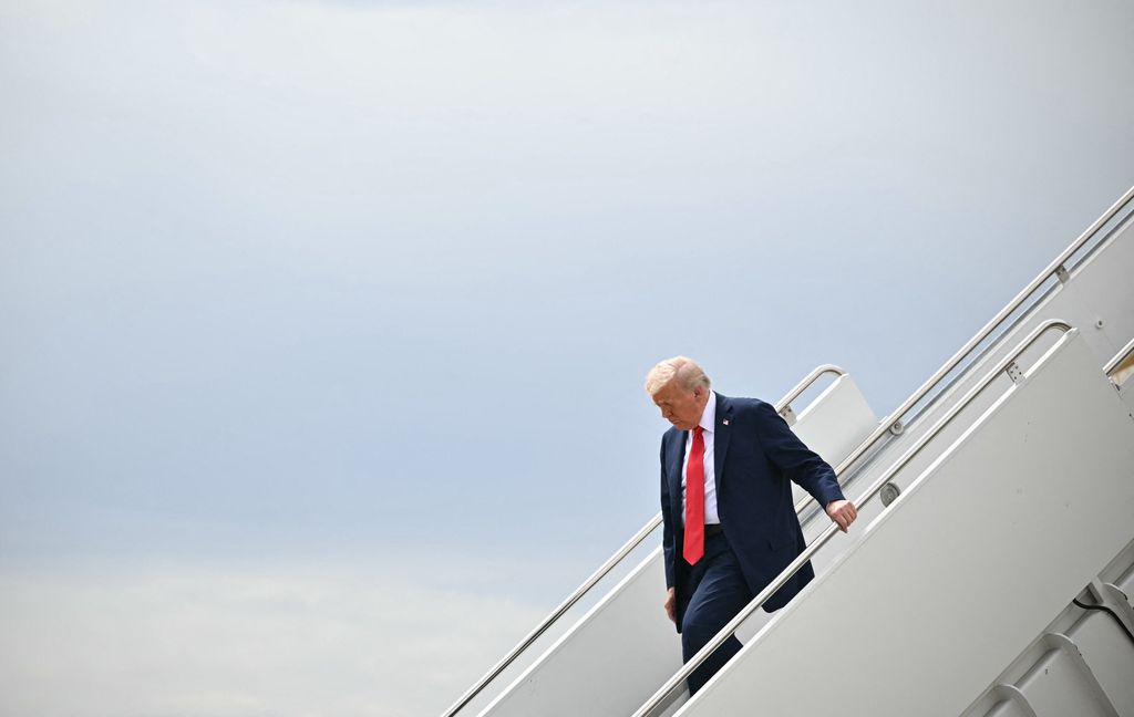 US President Donald Trump steps off Air Force One upon arrival at Luke Air Force Base in Glendale, Arizona, on September 21, 2025 to attend the memorial for right-wing activist Charlie Kirk.