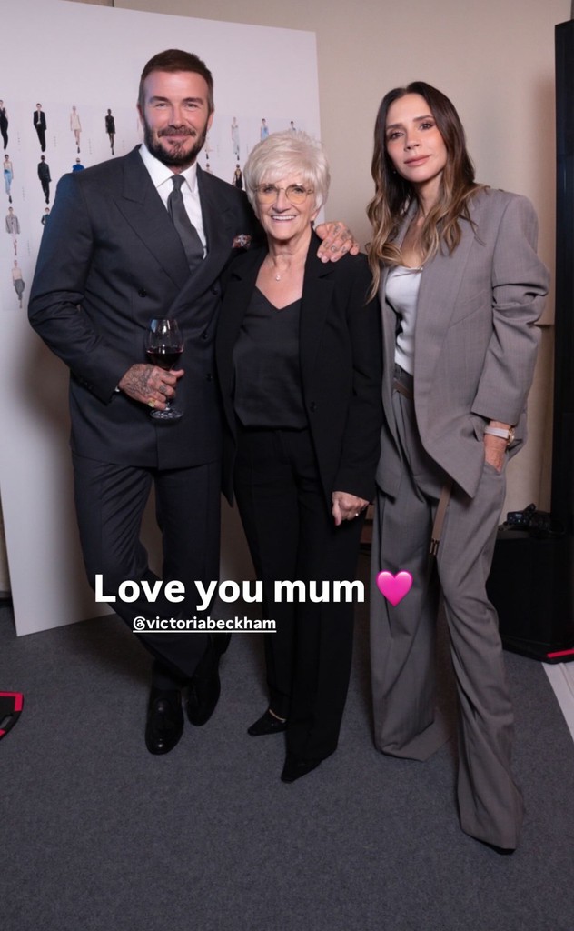 David and mum Sandra beside wife victoria, all in suits