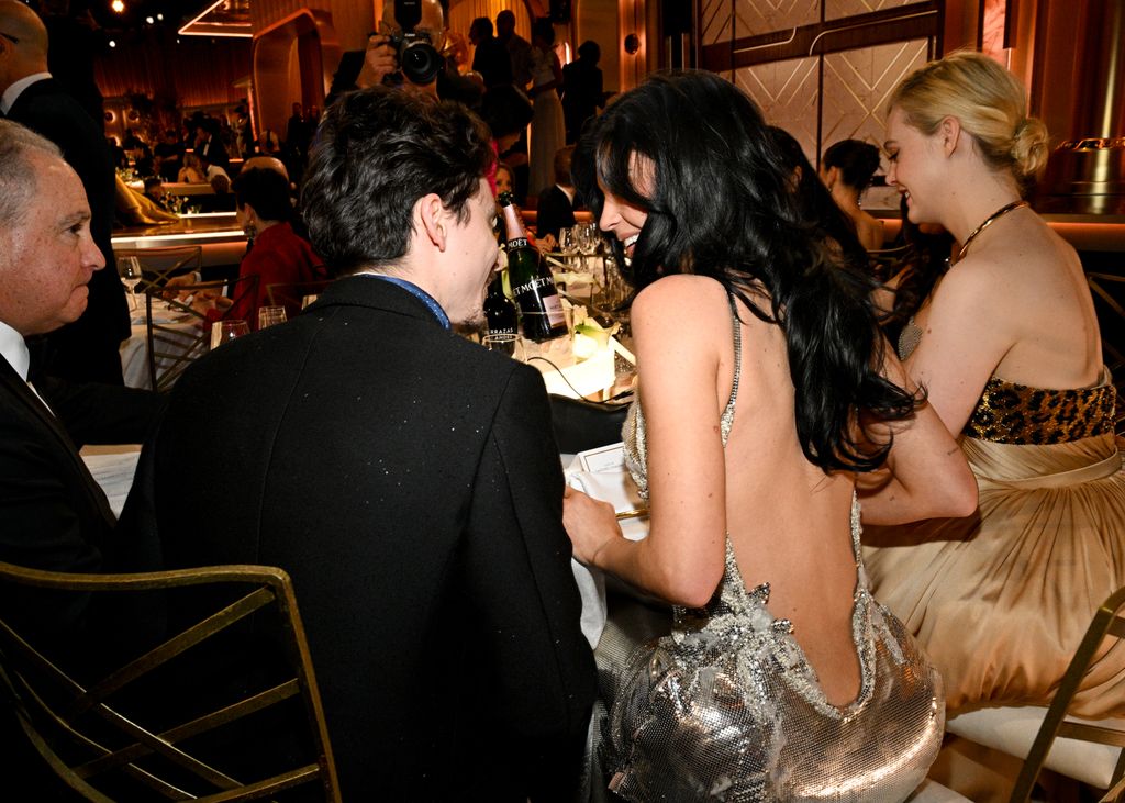 Kylie Jenner and Timothee Chalamet giggling at the 2025 Golden Globes