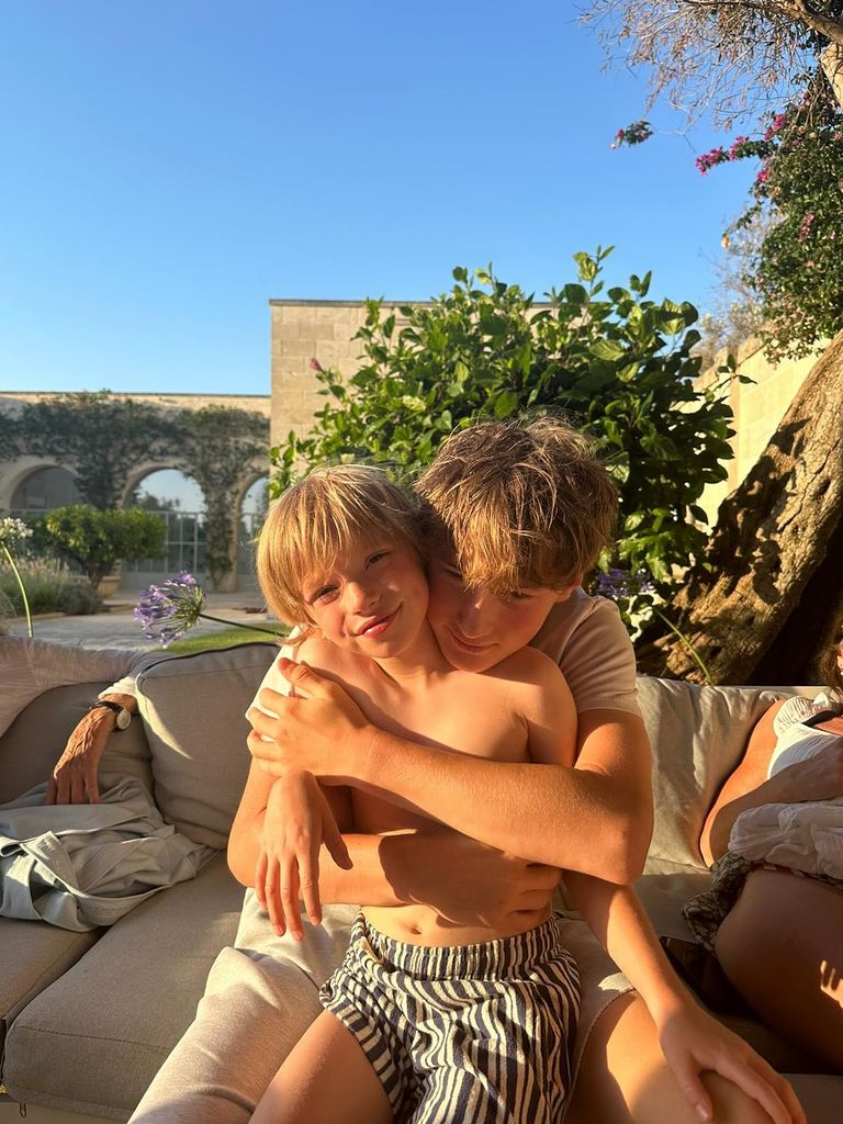 Buddy and River hugging