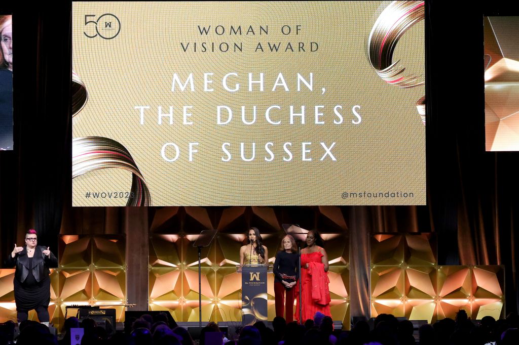 Meghan received the Woman of Vision award