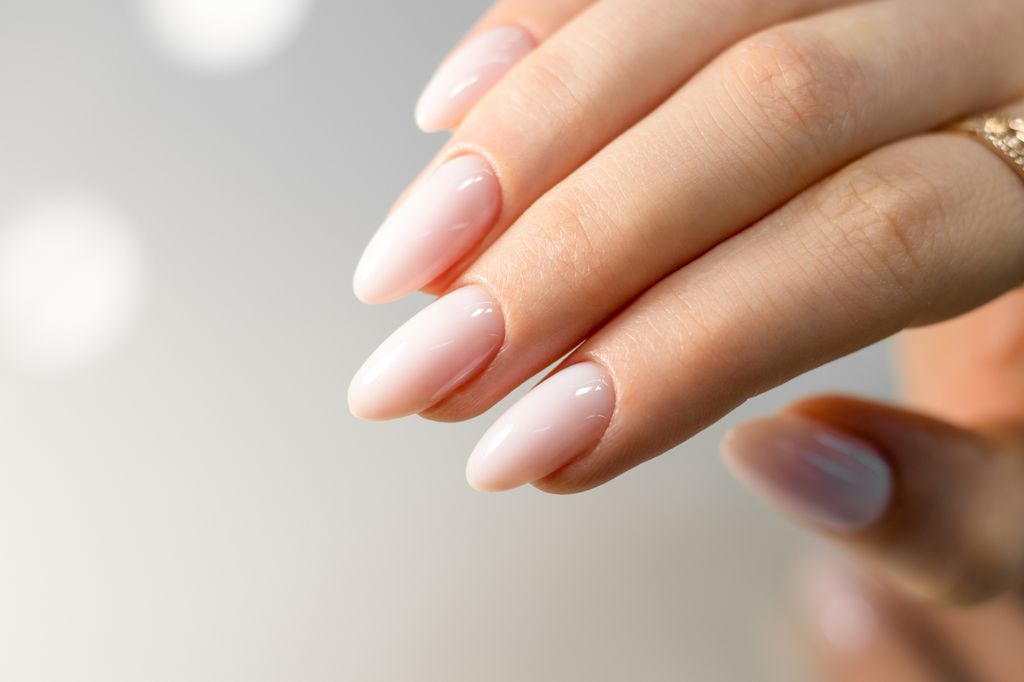Beautiful nude Manicure Long Almond Shaped Nails 