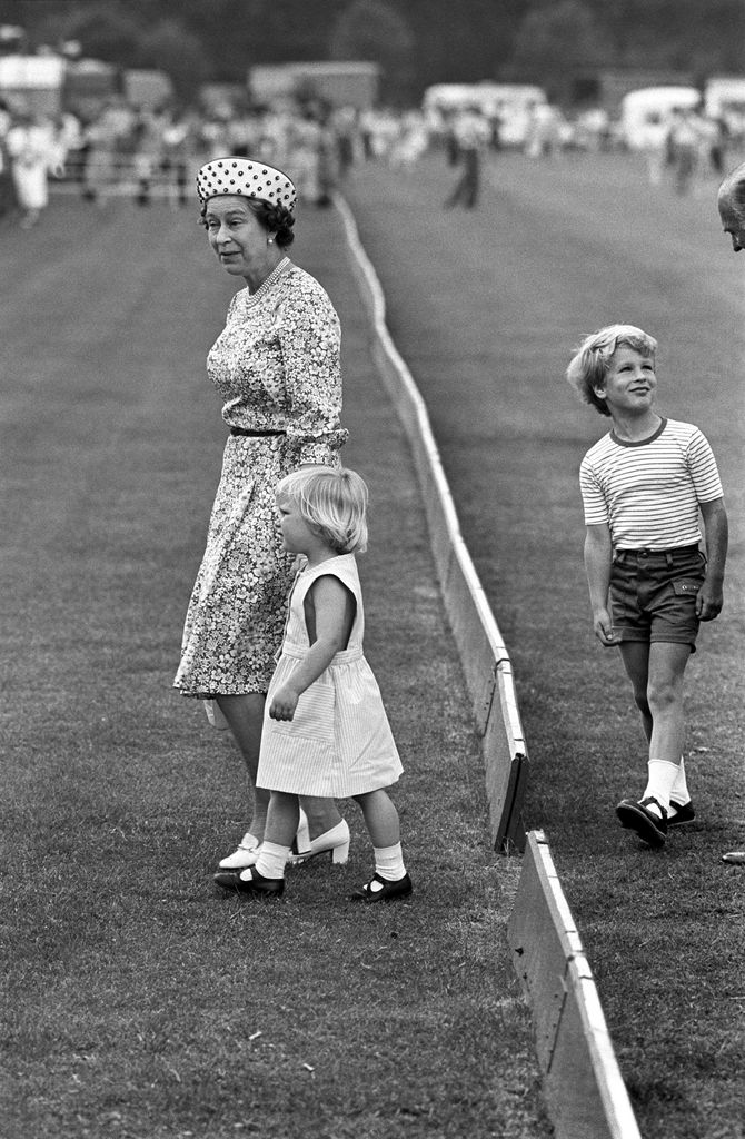The Queen with Zara and Peter Phillips in 1984