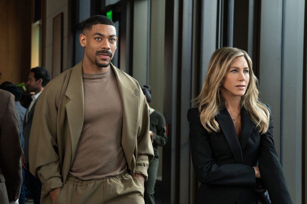 A man and a woman walk side by side