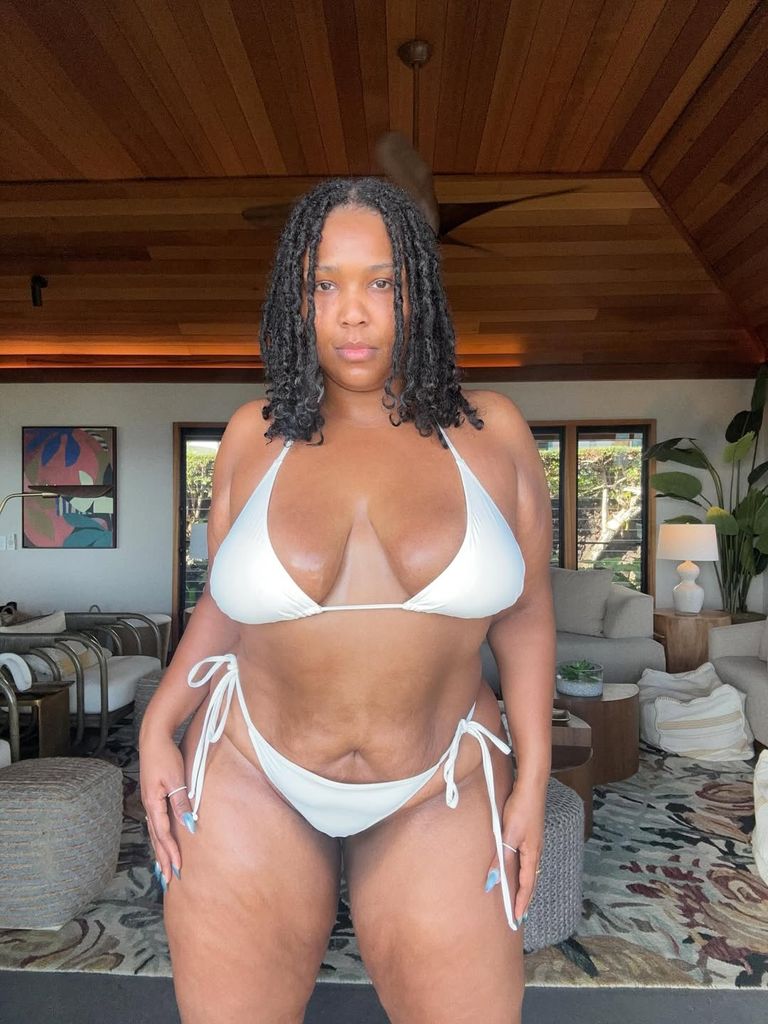 Lizzo wearing a bikini from her own collection