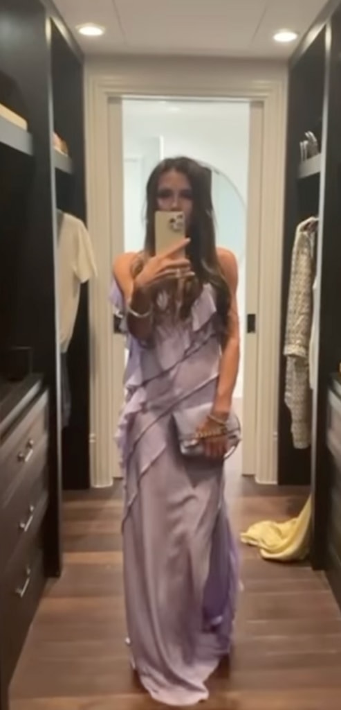 Victoria Beckham dazzling in a lilac dress