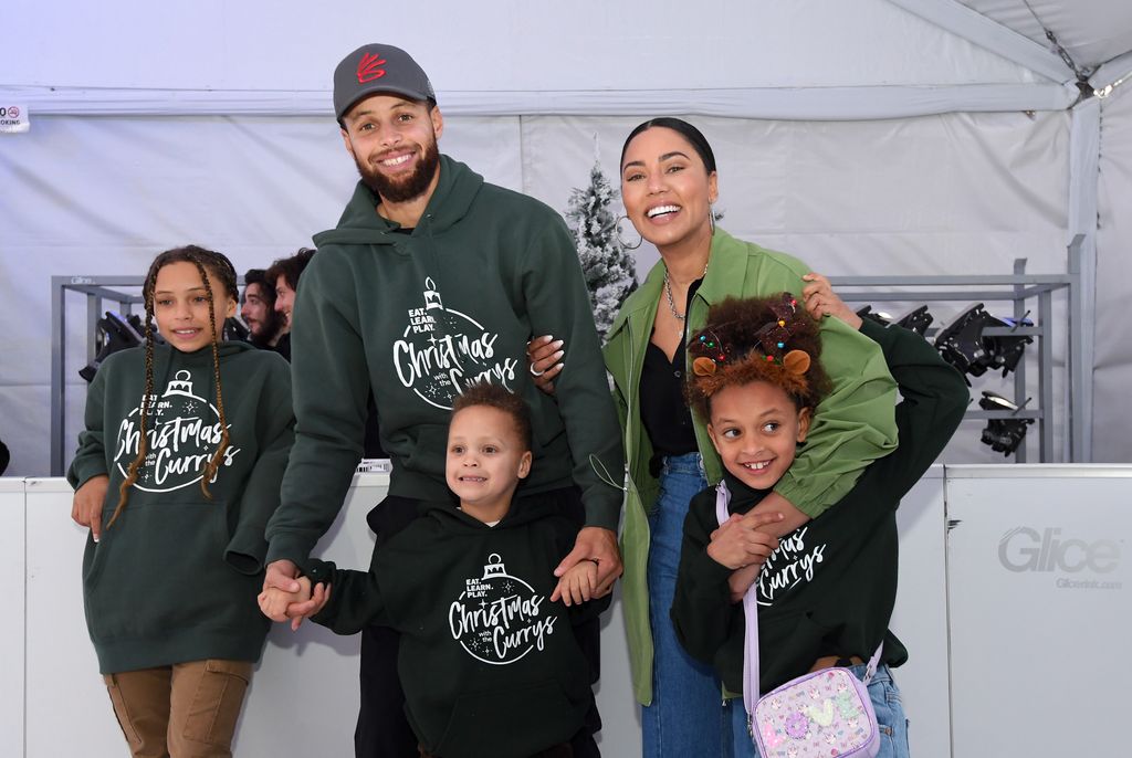 Riley Elizabeth Curry, Stephen Curry, Canon W. Jack Curry, Ayesha Curry and Ryan Carson Curry attend Eat. Learn. Play.'s 10th Annual Christmas with the Currys Celebration at The Bridge Yard on December 11, 2022 in Oakland, California