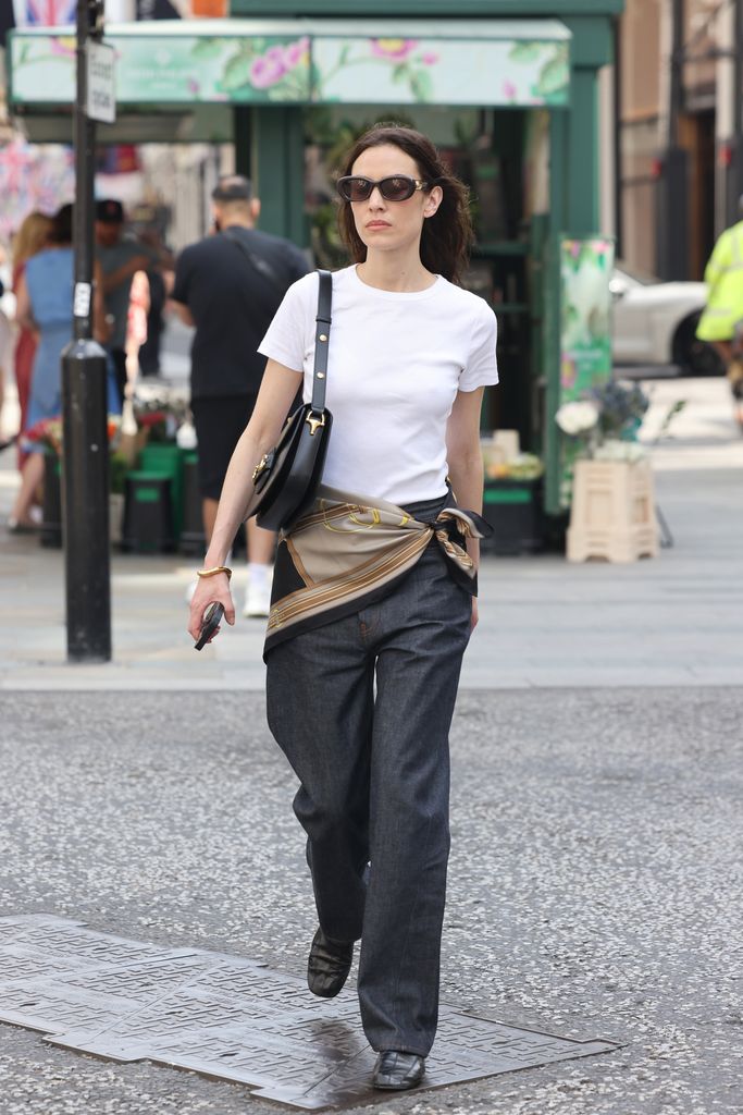 Alexa Chung wrapped a Gucci scarf around her waist