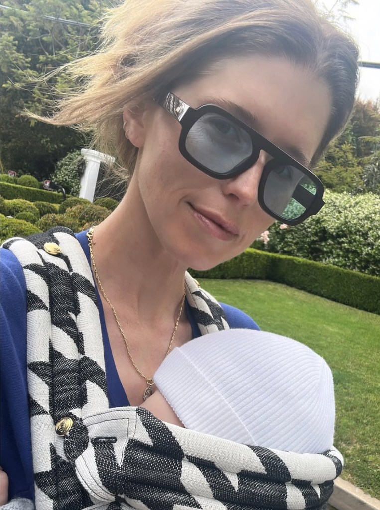 Selfie shared by Katherine Schwarzenegger carrying her baby son Ford on an Artipoppe baby carrier