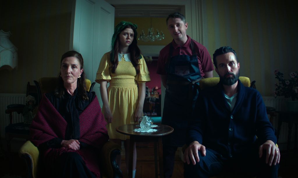 group of people in dimly-lit room