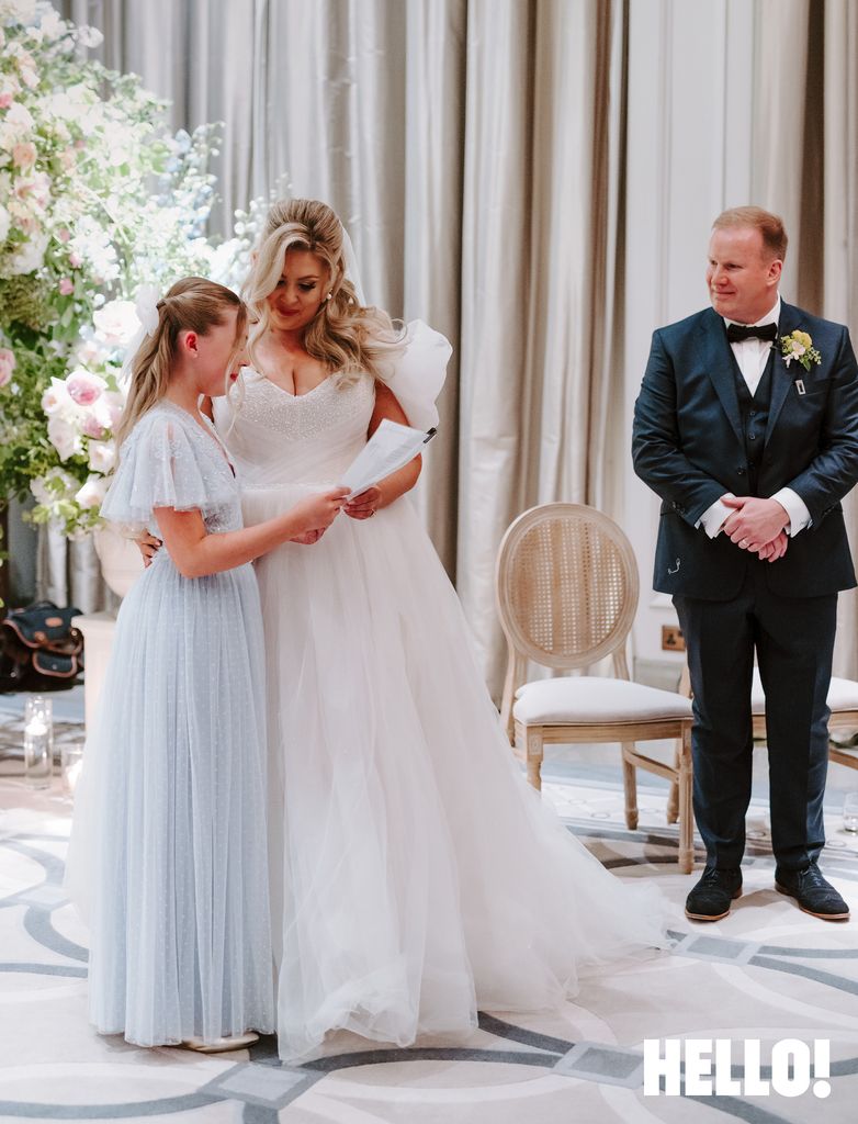 Louise Pentland helping her daughter read a speech at her wedding