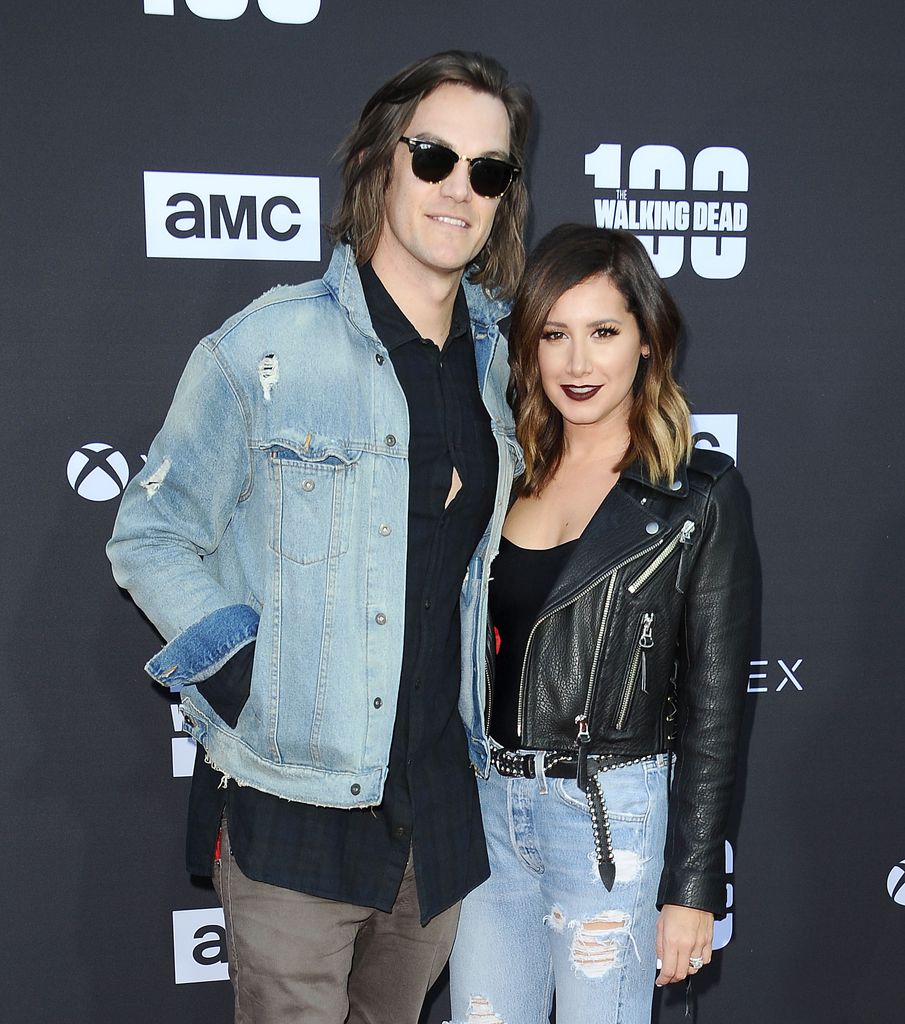Ashley Tisdale and husband of nine years, musician Christopher French, are rocker chic on the red carpet at a Hollywood event in October 2017.