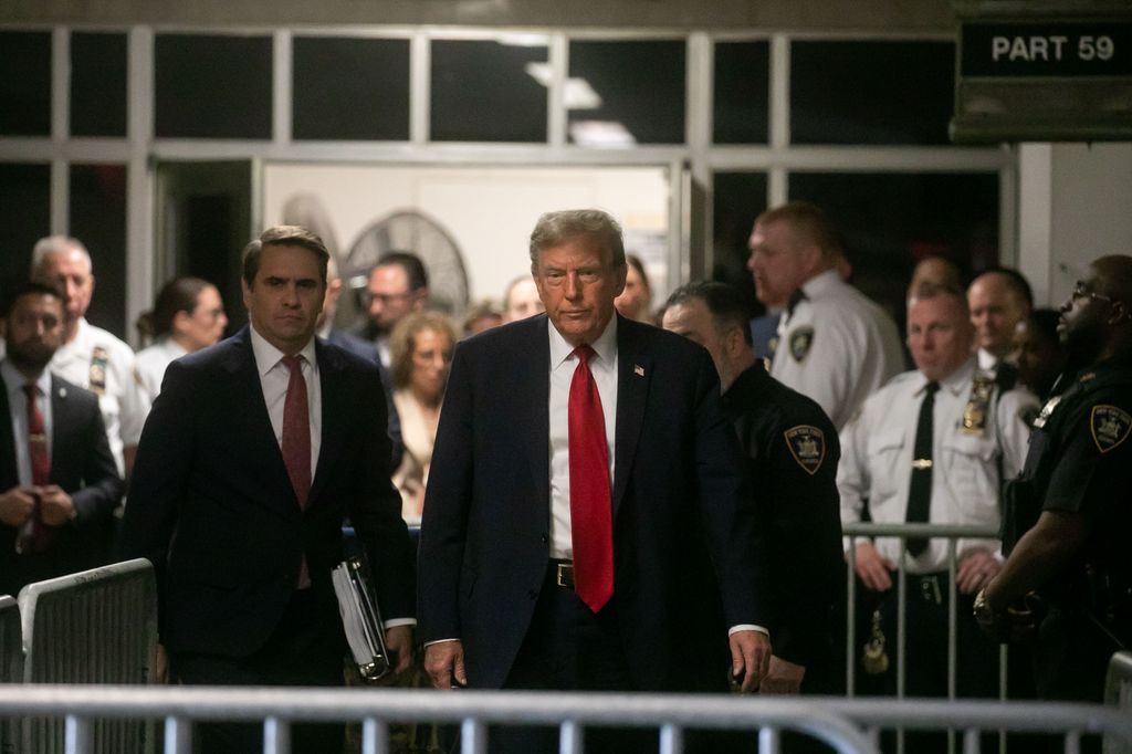 Former U.S. President Donald Trump arrives for the first day of his trial for allegedly covering up hush money payments at Manhattan Criminal Court on April 15, 2024 in New York City. Former President Donald Trump faces 34 felony counts of falsifying business records in the first of his criminal cases to go to trial