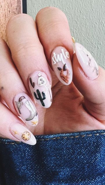 pink western nails with cactus and cowboy boots