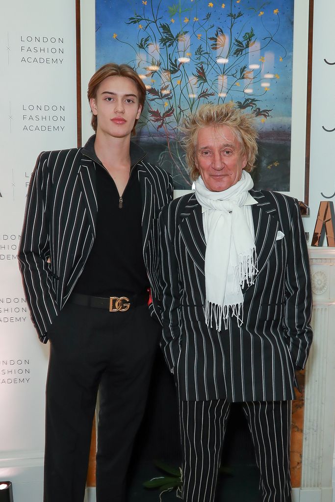 Sir Rod Stewart in matching black and white jacket with son