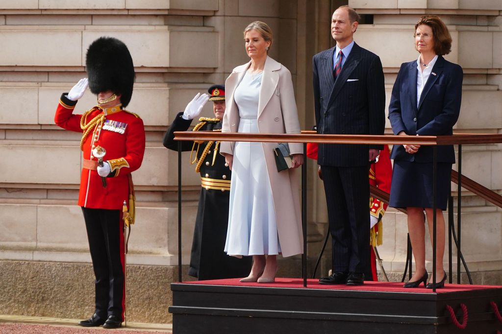  The Duke and Duchess of Edinburgh standing at Buckingham Palace for Changing of the Guard 