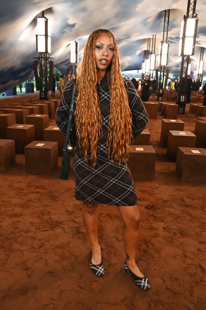 Nia Archives attends the Burberry Summer 2026 show during London Fashion Week on September 22, 2025 in London, England. (Photo by Dave Benett/Getty Images for Burberry)