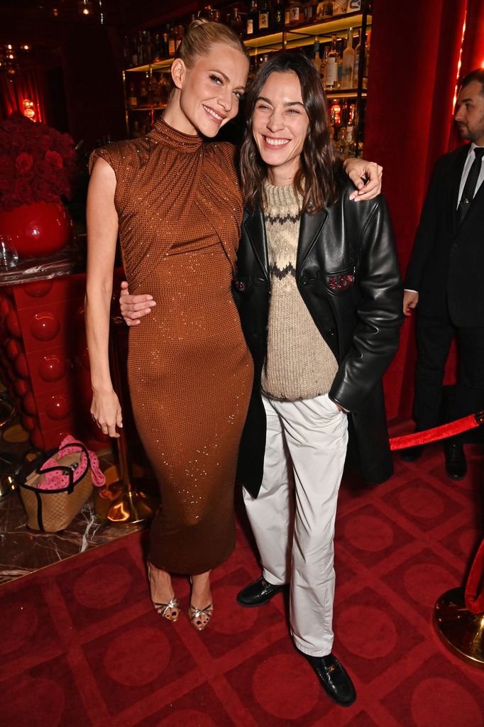 Poppy Delevingne and Alexa Chung attend the Mrs Alice x Della Vite cocktail party hosted by Poppy Delevingne and Alice Naylor-Leyland to celebrate the start of the festive season Upstairs at Langan's Brasserie on November 28, 2023 in London, England. (Photo by Dave Benett/Getty Images)