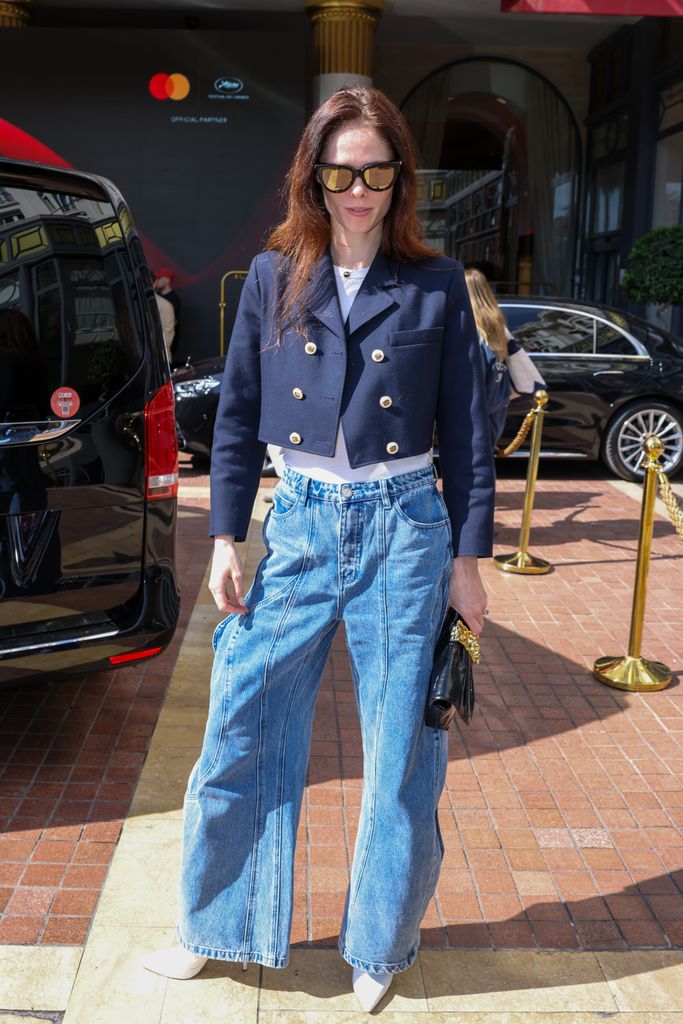 Coco Rocha is seen at Le Majestic Hotel during the 77th Cannes Film Festival on May 19 in jeans and a crop blazer